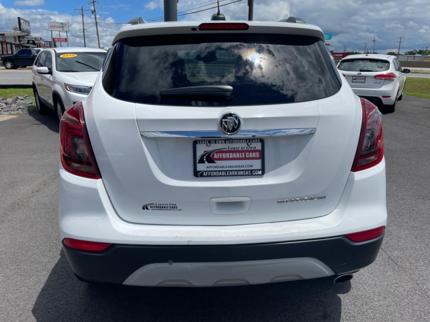 2019 White Buick Encore (KL4CJCSM7KB) with an 4-Cyl, Turbo, 1.4 Liter engine, Automatic, 6-Spd w/Overdrive and Shift Control transmission, located at 8008 Warden Rd, Sherwood, AR, 72120, (501) 801-6100, 34.830078, -92.186684 - Photo#6